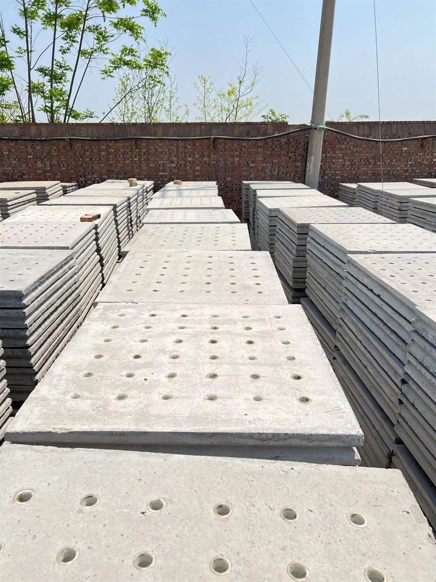Finished concrete filter plates stacked in the storage yard