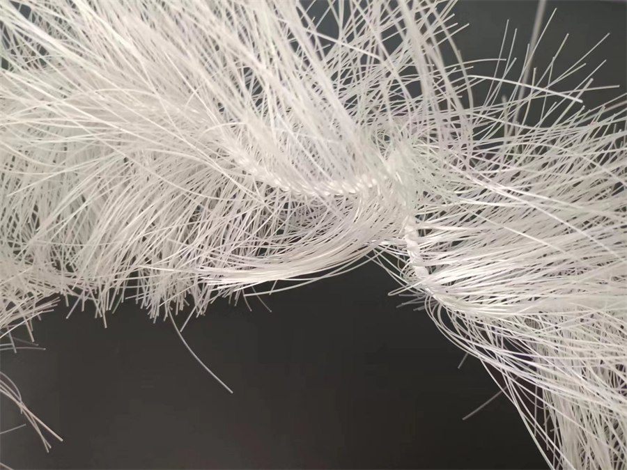 Elastic packing filaments photographed on a dark background
