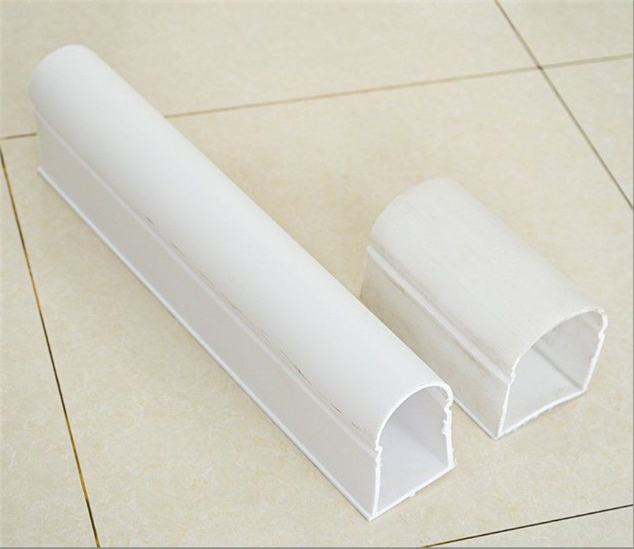 Two white HDPE bread pipes with U-section profile