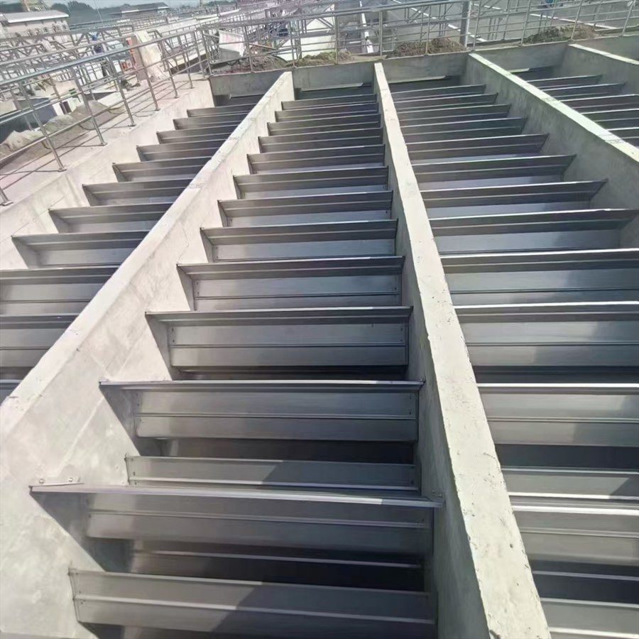 Installed folded plates in a concrete channel, top view