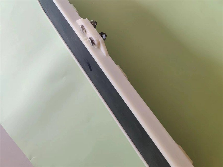 Plate aerator seen at a steep angle, showing the membrane seated in the frame