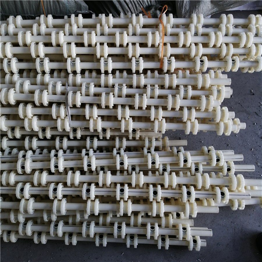 Aerator pipes stacked in rows on a workshop floor