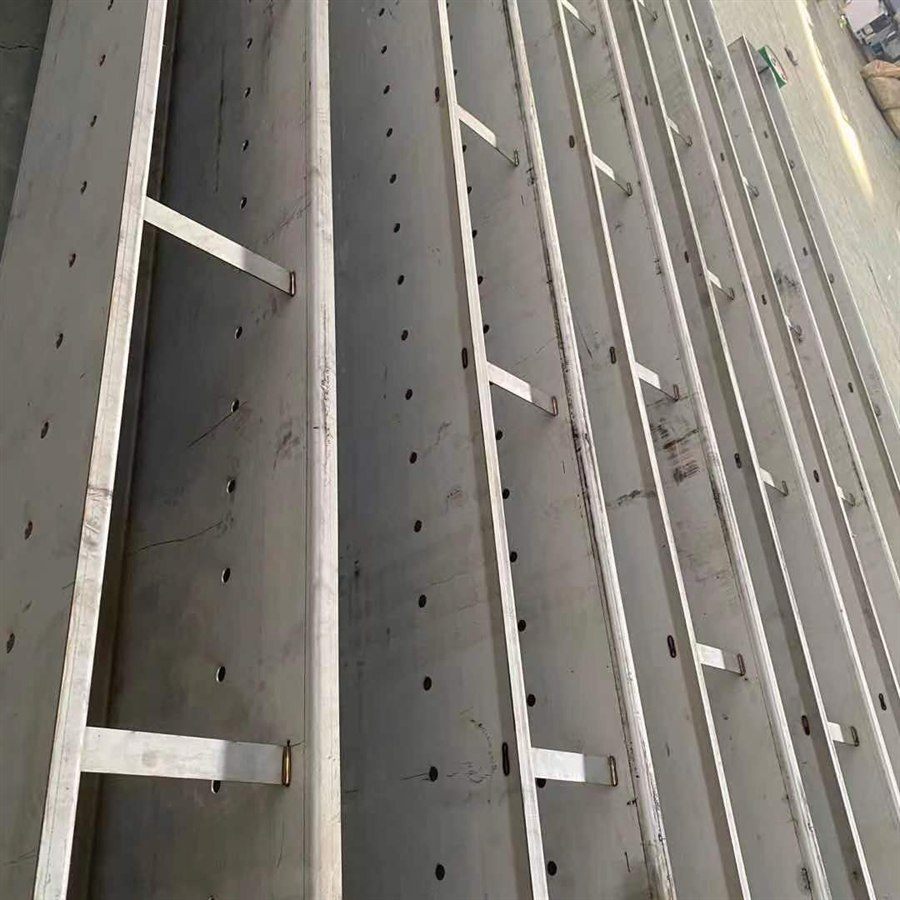 Detail of the perforated wall and stiffeners of a stainless steel collection trough
